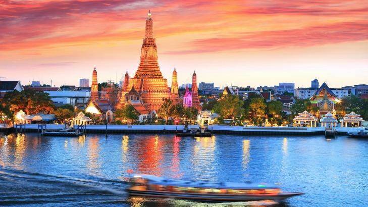 The iconic Wat Arun, Thailand, at  sunset.