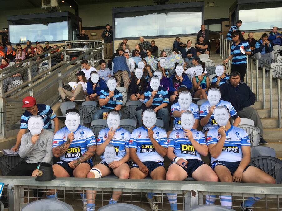 Macquarie players in their Brett Warwick masks on Saturday. 			           Photo: CONTRIBUTED
