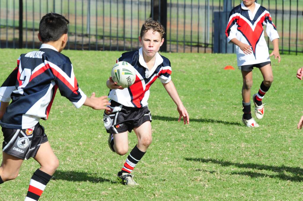 LEFT: Leory Murray in action for Cowra's Mulyan Public School.