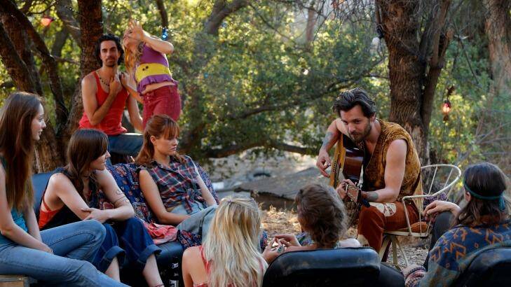 Downward spiral: Gethin Anthony as Charles Manson (second from right) in <i>Aquarius</i>.  Photo: Supplied