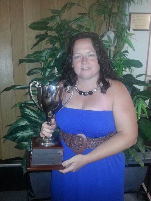 Hearing-impaired golfer Chantell Grieves after being awarded Dunedoo s senior sportsperson of the year in 2013.