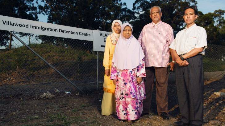 Piah Samat, mother, and Noriatin Umar, sister of convicted killer Sirul Azhar Umar, with Malaysian opposition politicians outside Villawood detention centre. Photo: James Brickwood