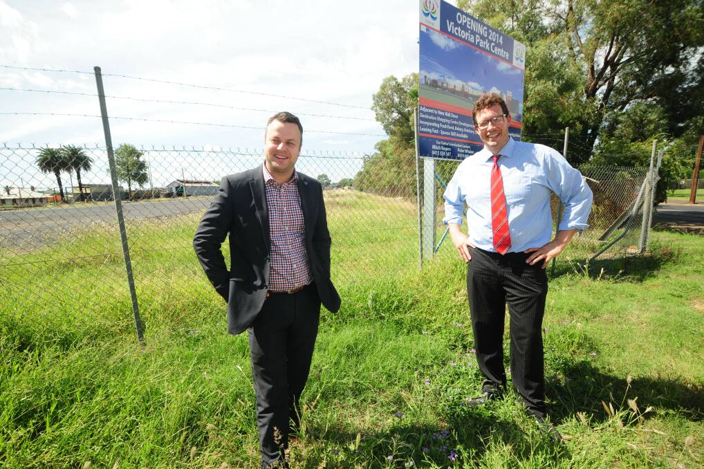 Victoria Park Centre estate agent Laagan Whalan and colleague Matt Rendell at the site that could become home to a new cinema, subject to development approval. Photo: BELINDA SOOLE