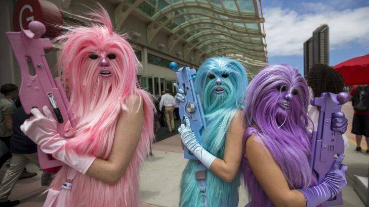 Star Wars enthusiasts wear costumes resembling what they say are three "Chew's Angels" during the 2015 Comic-Con International Convention in San Diego. Photo: Maro Anzuoni