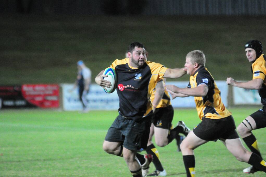 Justin Lane in action for Dubbo Rhinos Black earlier this season. Their 2014 campaign came to end after a loss to Wellington on Saturday. 	Photo: Kathryn O Sullivan