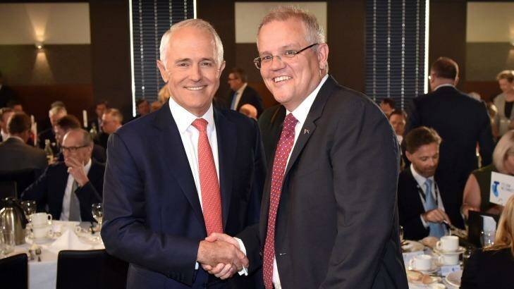 Prime Minister Malcolm Turnbull andTreasurer Scott Morrison have put pressure on banks over their high credit card interest rates. Photo: Mark Graham