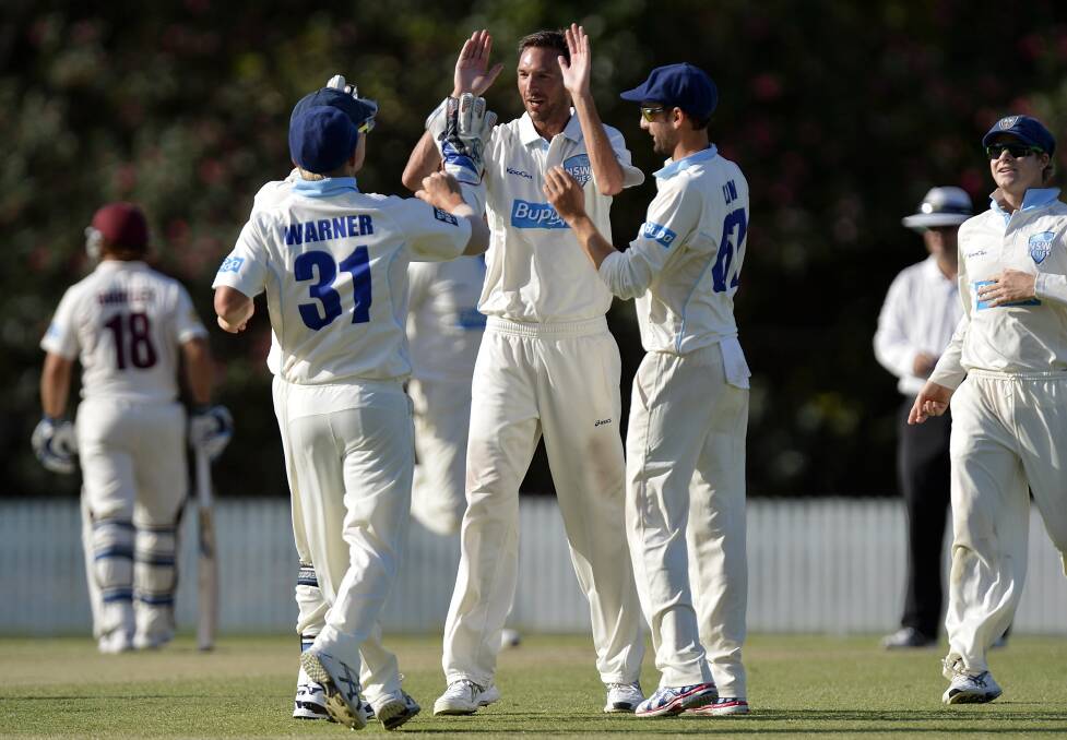 Trent Copeland, pictured celebrating a wicket with NSW teammates last season, will be in Dubbo tomorrow with fellow NSW Blues player, Scott Henry. 			 		        Photo: Getty Images