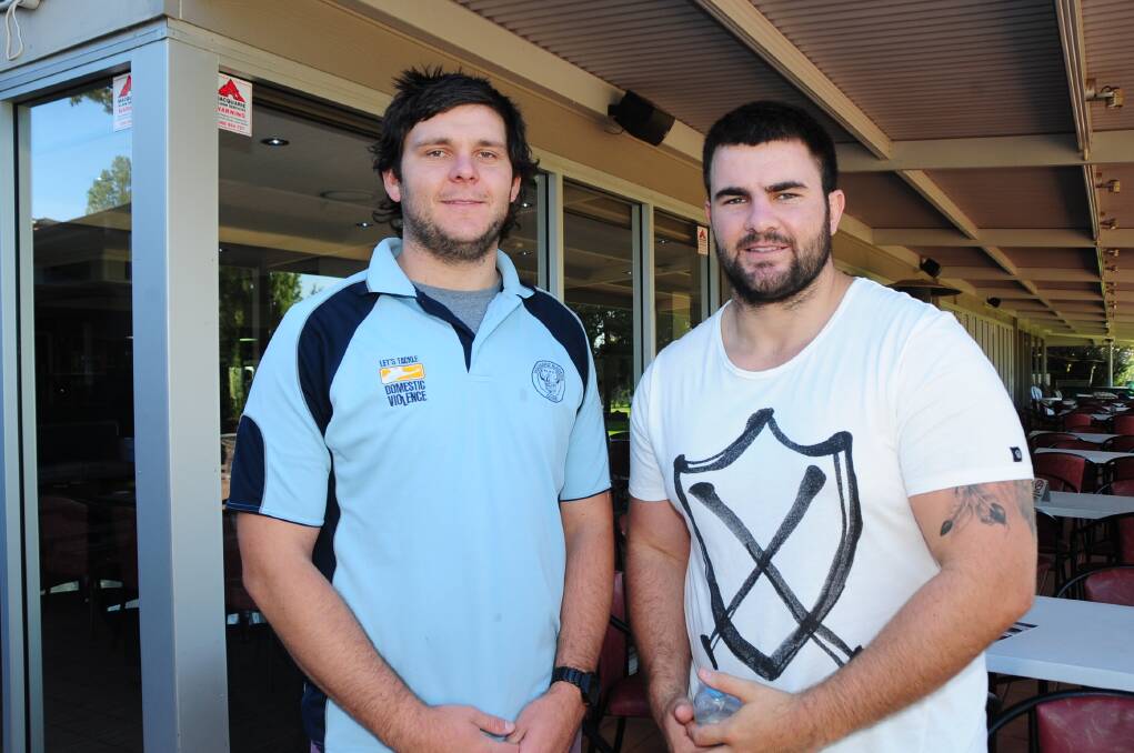 Anthony Egan (left) with Dylan Hill at last year's Macquarie Raiders golf day. Egan will captain the club in 2015.
