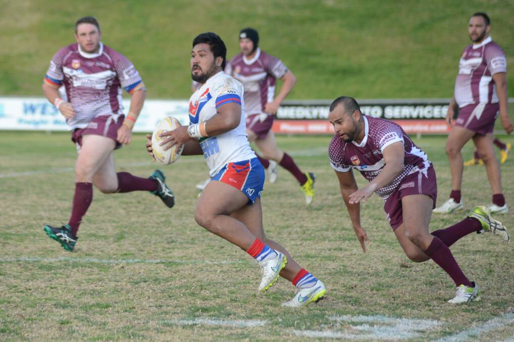 Tino Ionatana makes a bust for the Parkes Spacemen in their win over Wellington on Sunday. 	Photo: RENEE POWELL