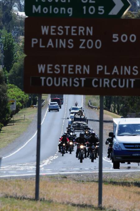 The postie bikes on the last leg of their ride along the Newell Highway. Photo GREG KEEN.