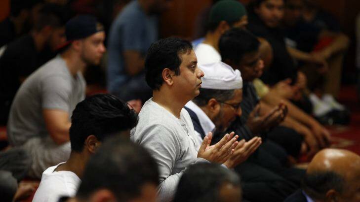 "No one should take their freedom, safety and acceptance for granted" ... worshippers at Parramatta Mosque, where chairman Neil El-Kadomi condemned the terrorist attack at the nearby police headquarters. Photo:  Wolter Peeters