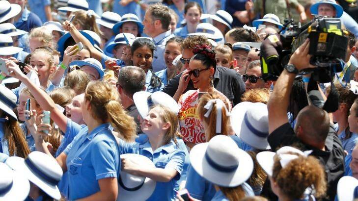 Phone fetish: Katy Perry was welcomed by smart phones instead of smiles at Loreto Mandeville Hall in Melbourne. Photo: Eddie Jim