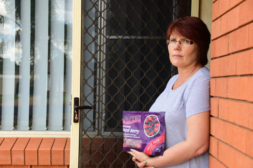 Leisa Ross with the packet of Nanna's frozen mixed berries is believed to have her Hepatitis A. 									  Photo: BELINDA SOOLE