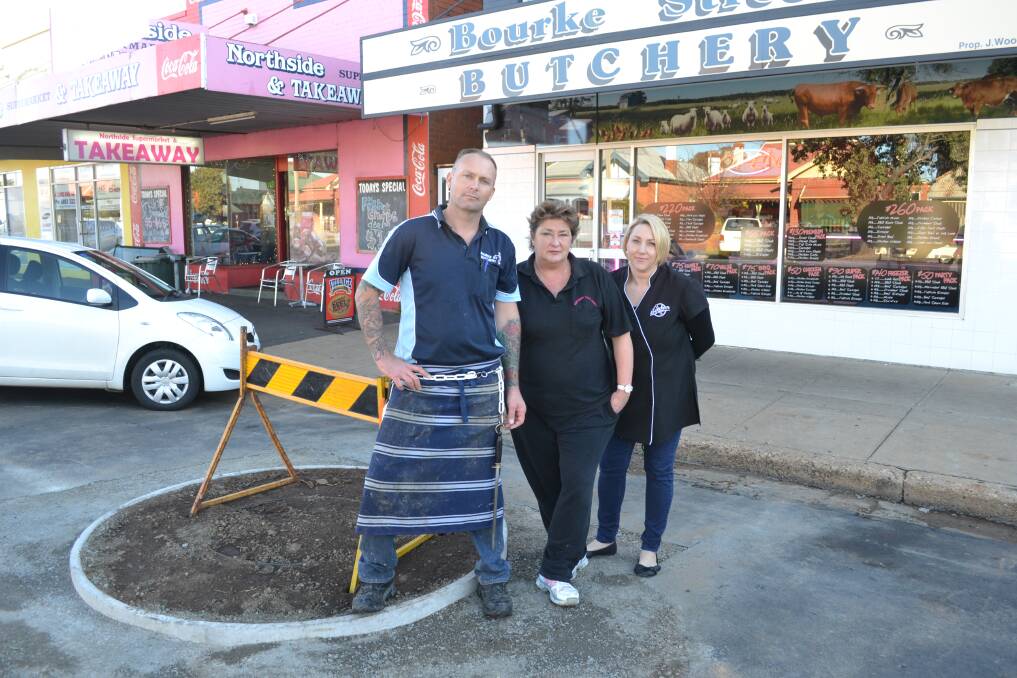 Bourke Street Butchery part-owner Jason Wood, Northside Supermarket and Takeaway owner Karen Lynch and Barber on Bourke owner Shannon Thompson are annoyed about trees being planted in front of their businesses. 	   Photo: ORLANDER RUMING