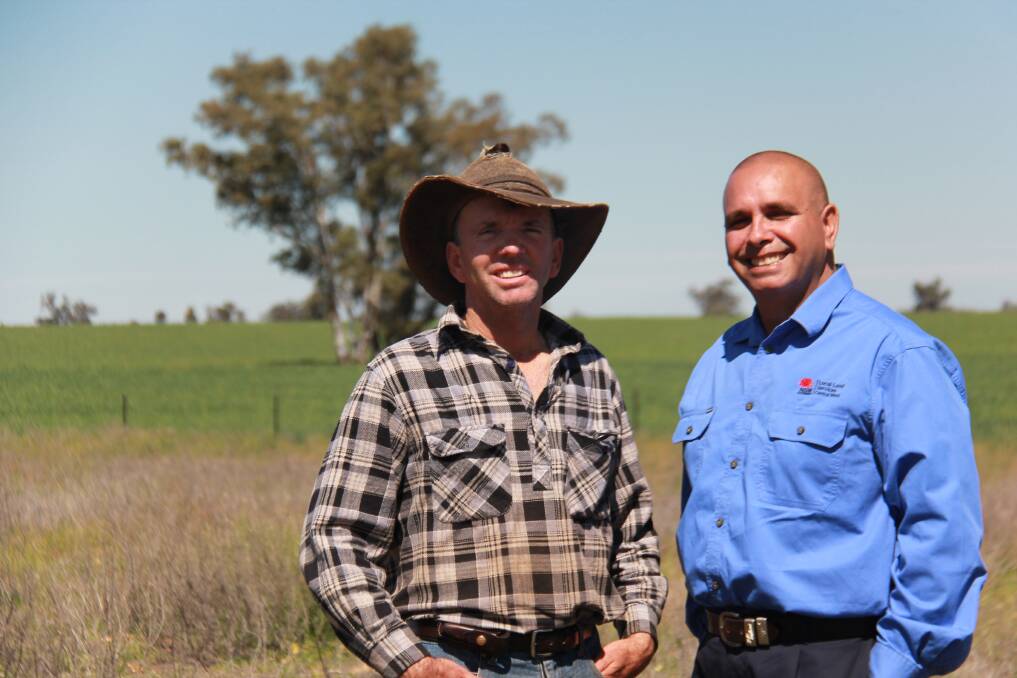 Aboriginal communities officer Mike Nolan (right) with farmer Michael Zell. 	        Photo: CONTRIBUTED