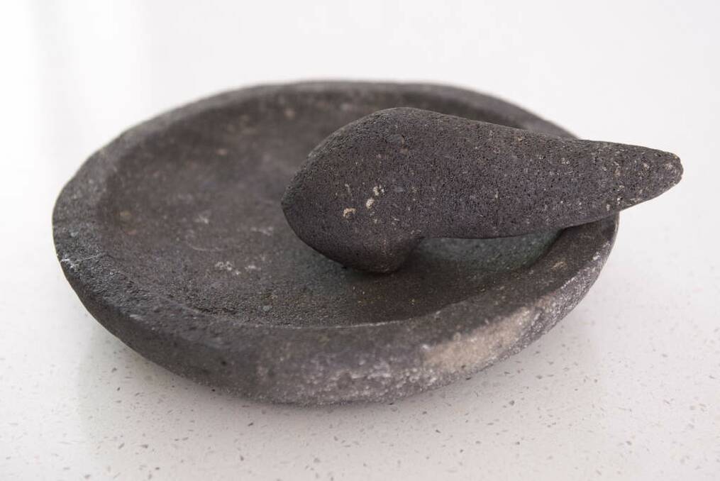 O'Donoghue bought this stone mortar and pestle at Chinatown in London and carried it all the way back to Australia. Photo: Harrison Saragossi