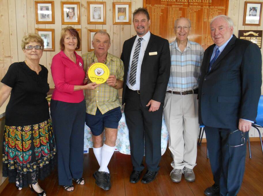 Margaret Rootes, Anne Bassett, Ken Bailey, Gus Lico, Col Rootes and Tom Toohey at the cheque presentation to Camp Quality at Muller Park Tennis Club. 												    Photo: CONTRIBUTED