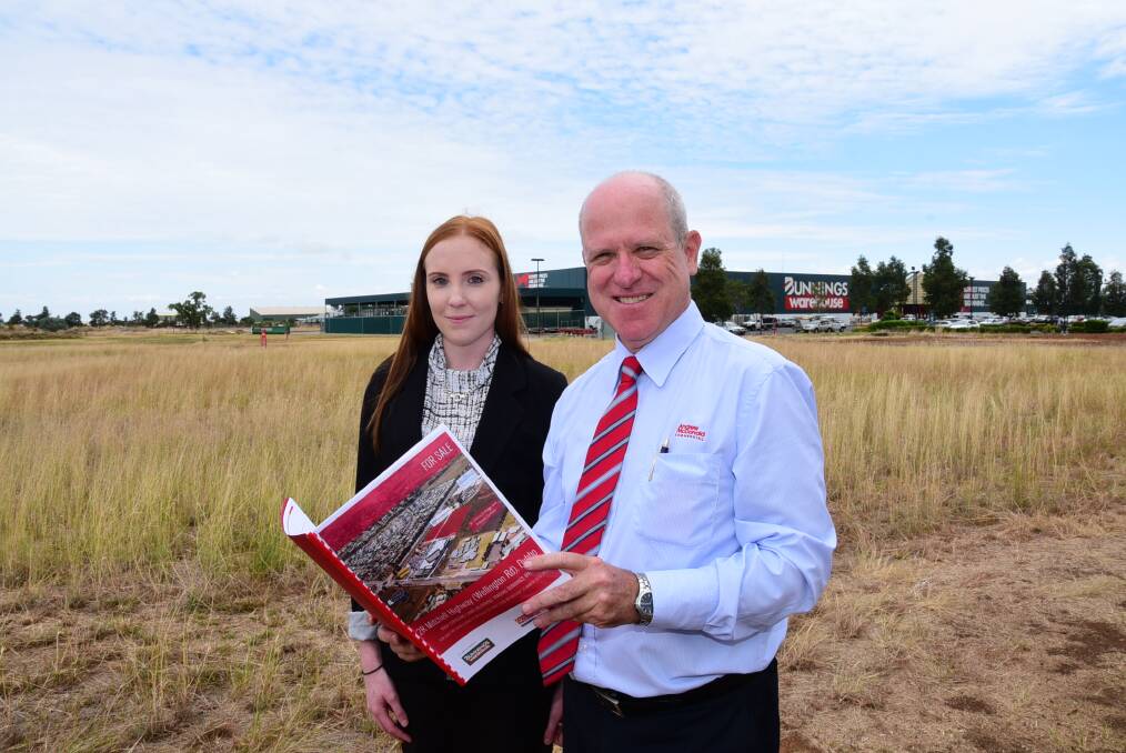 Andrew McDonald Commercial's Nateesha Robertson and Andrew McDonald take another look at the land it is selling on behalf of Bunnings Group Limited. Photo: BELINDA SOOLE