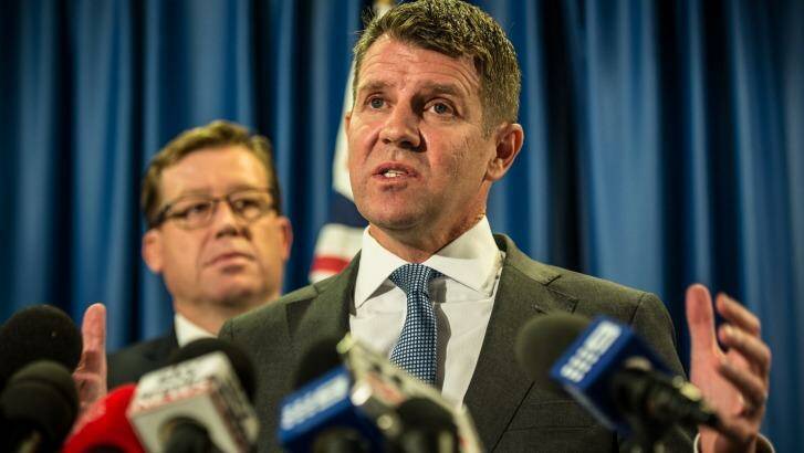 'I got it wrong': Premier Mike Baird with Deputy Premier Troy Grant at the press conference on Tuesday.  Photo: Wolter Peeters