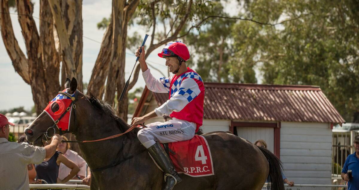 Stuart Brown returns to scale after riding Girls Lib to victory at Bedgerabong in February.  
Photo: JANIAN McMILLAN  
(www.racingphotography.com.au)