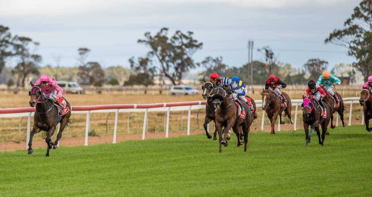 Savannah Girl (pink colours) holds off Exciteanation (pale blue) at Narromine on Sunday.	Photo: JANIAN McMILLAN (www.racingphotography.com.au)