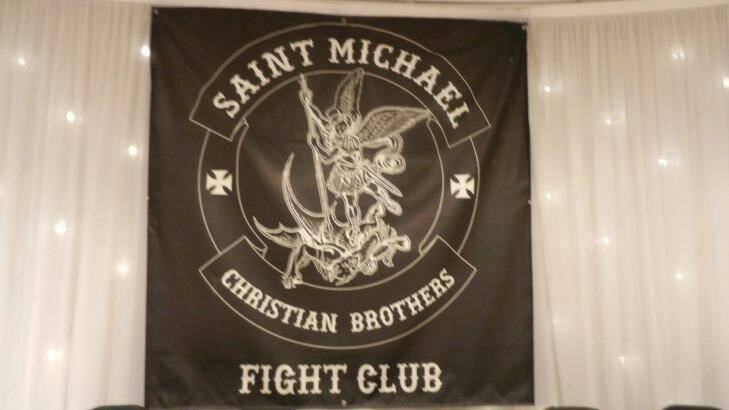 The Saint Michael Christian Brothers Fight Club banner at a anniversary dinner in 2012. Photo: Facebook/Taipan Muy Thai Unleashed