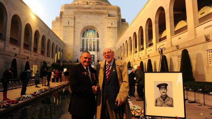 Keith Payne, right, with former ACT RSL president, and World War Two veteran, Ron Metcalfe, of Hughes, at the Australian War Memorial for the Last Post ceremony commemorating the beginning of World War One. Photo: Melissa Adams