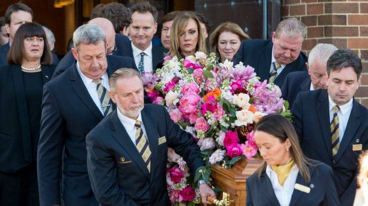 Lady Renouf's coffin is carried from St Andrew's Church on Wednesday. Photo: Penny Stephens