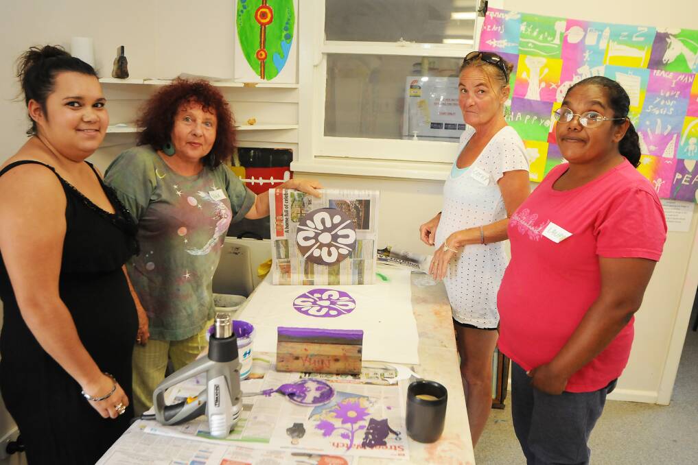 Chelsea Wood, Nina Angelo, Cathy Murray and Laura Fernando at the screen printing workshop on Wednesday. 	   Photo: BELINDA SOOLE