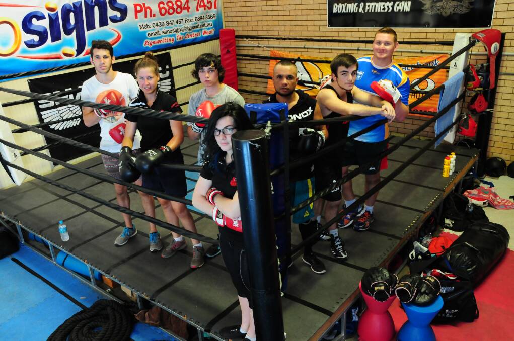 Local boxers Stephen Wilson, Ayla Barker, Parker Watson, Briarne Luckie (front), Barry Toomey, James Butcher and Shane Konz will all be in action next Friday night. 	Photo: Greg Keen
