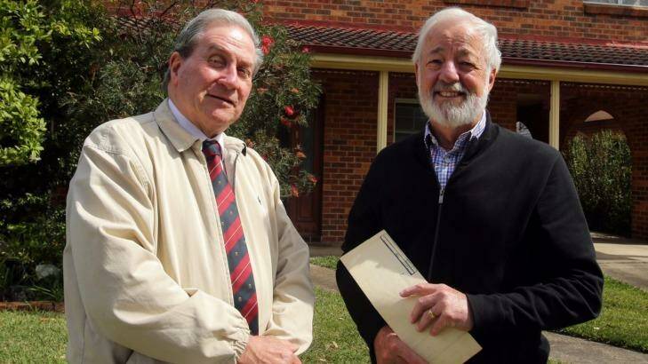 Ian McCormack (left) and Bruce Langley say the government's rush to privatise Land, Property and Information caused the massive error. Photo: Chris Lane