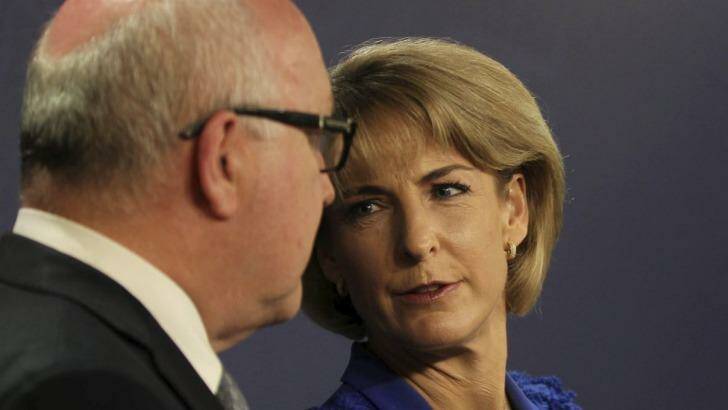 Senators George Brandis and Michaelia Cash have opposed a national anti-corruption body, but have stood by the re-establishment of the Australian Building and Construction Commission. Photo: Janie Barrett