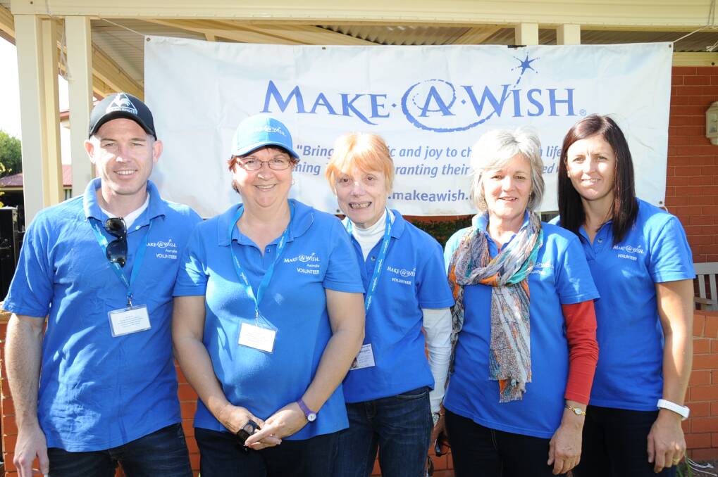 Make-A-Wish volunteers Luke O'Neill, Karen McMullen, Gai Manusu, Lyn Allen and Janelle Toshack. 	       Photo: KATHRYN O'SULLIVAN