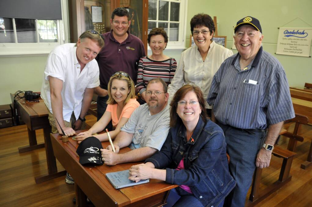 Rotary group study exchange leader Brad Pyott, team member Paul Anctil, Rotarians from Dubbo Deb Anemaat, Cheryl Pfeiffer and Bert McLellan, and (sitting), Becky Wilburn, Steve Martin and Michelle Scarlino at Western Plains Cultural Centre's educational resource centre.  
Photo: contributed