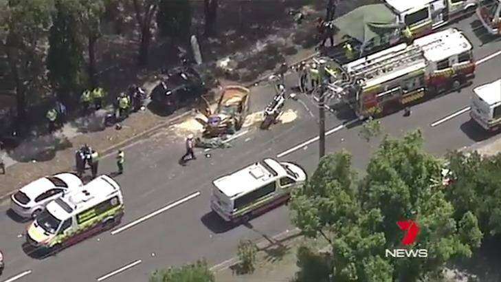 Emergency services at the scene of a car crash at Cabramatta  in which a woman and man have died.  Photo: Seven News Sydney