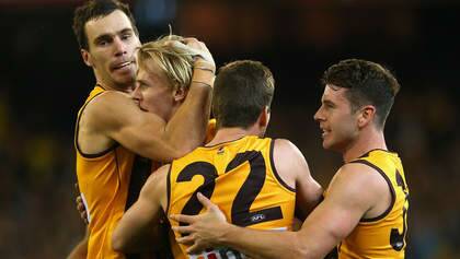 MELBOURNE, AUSTRALIA - AUGUST 23:  Will Langford of the Hawks is congratulated by team mates after scoring a goal during the round 22 AFL match between the Hawthorn Hawks and the Geelong Cats at Melbourne Cricket Ground on August 23, 2014 in Melbourne, Australia.  (Photo by Quinn Rooney/Getty Images) Photo: Quinn Rooney