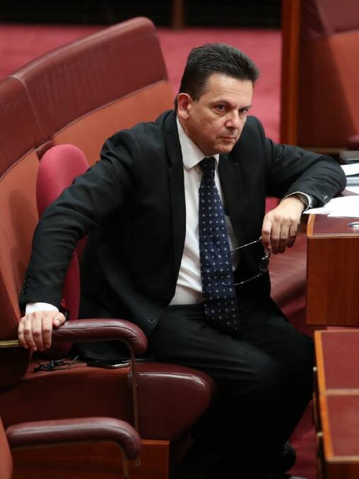 Senator Nick Xenophon after the Government won support for the company tax plan at Parliament House in Canberra on Friday 31 March 2017. Photo: Andrew Meares 