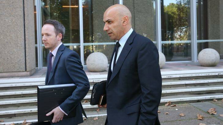 Moses Obeid, right, leaves the Federal Court on Tuesday. Photo: Louise Kennerley