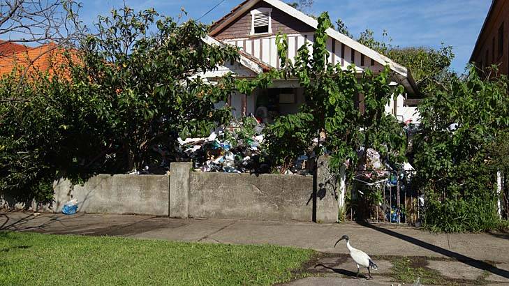 Residents of the Boonara Road house in Bondi tried to stop the clean up. Photo: Danielle Smith