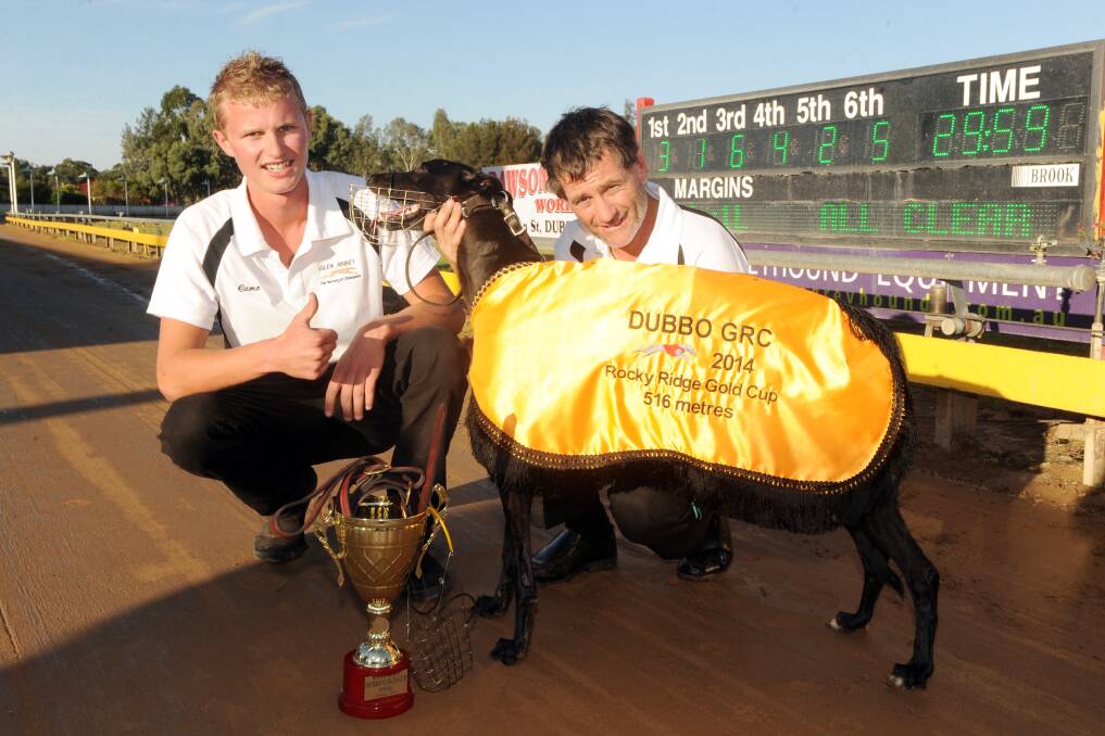 LEFT: Cameron Hallinan and Sam Jones with Tricky Jade after her win in the Gold Cup at Dawson Park yesterday.