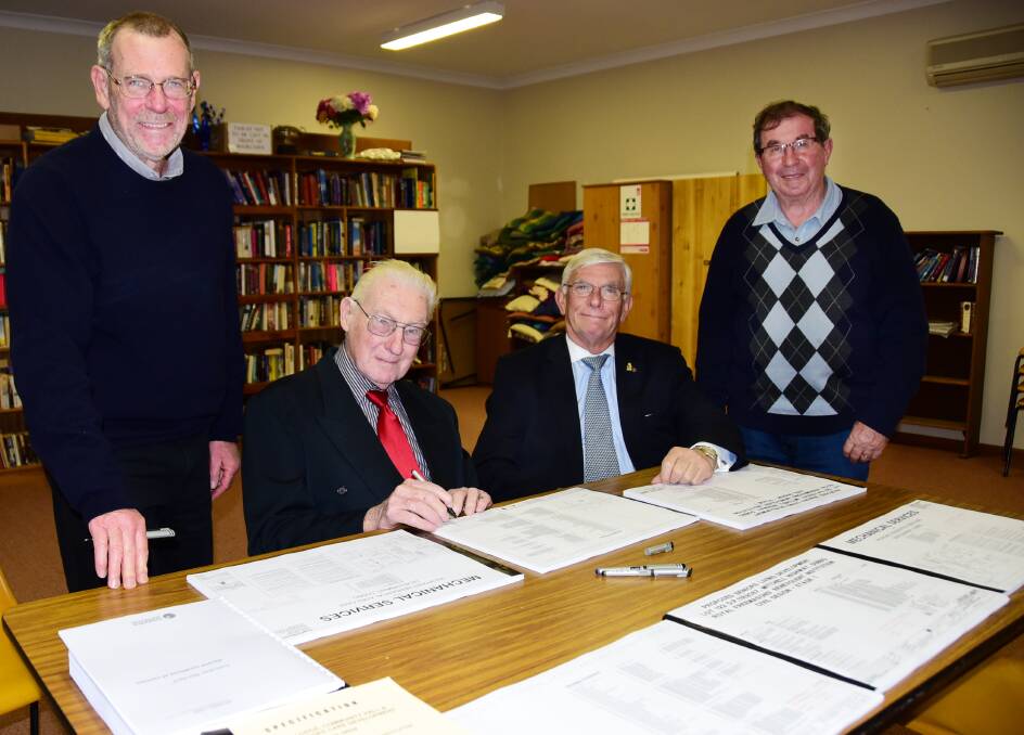 Architect David Mather, Royal Freemasons' Benevolent Institution of Australia president Ken Thompson, CEO Alex Shaw and Dubbo Terrazzo and Concrete Industries owner Nino Patriarca sign the contracts on Monday for the new aged care facility at Dubbo.  			      
Photo: BELINDA SOOLE