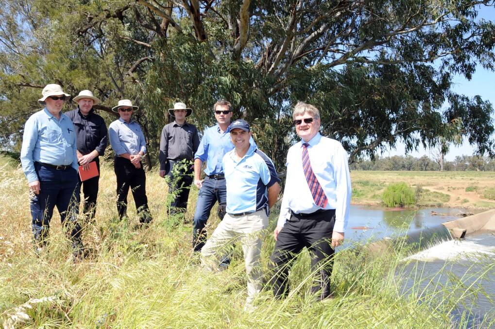 Alluvium Consulting representatives Michael Bain and Ivor Stuart, NSW Public Works representatives Chris Evans and John Bevan, Luke Morris from Barnson, Tim Marsden from Alluvium and Dubbo City Council technical services director Stewart McLeod at the site of the South Dubbo weir. 	  Photo: BELINDA SOOLE