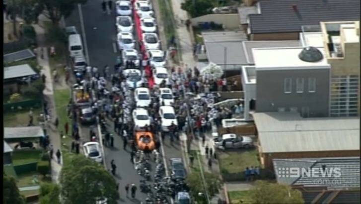 A fleet of stretch limousines, luxury cars including a Ferrari and and several Lamborghinis attend the venue. Photo: Channel 9 News