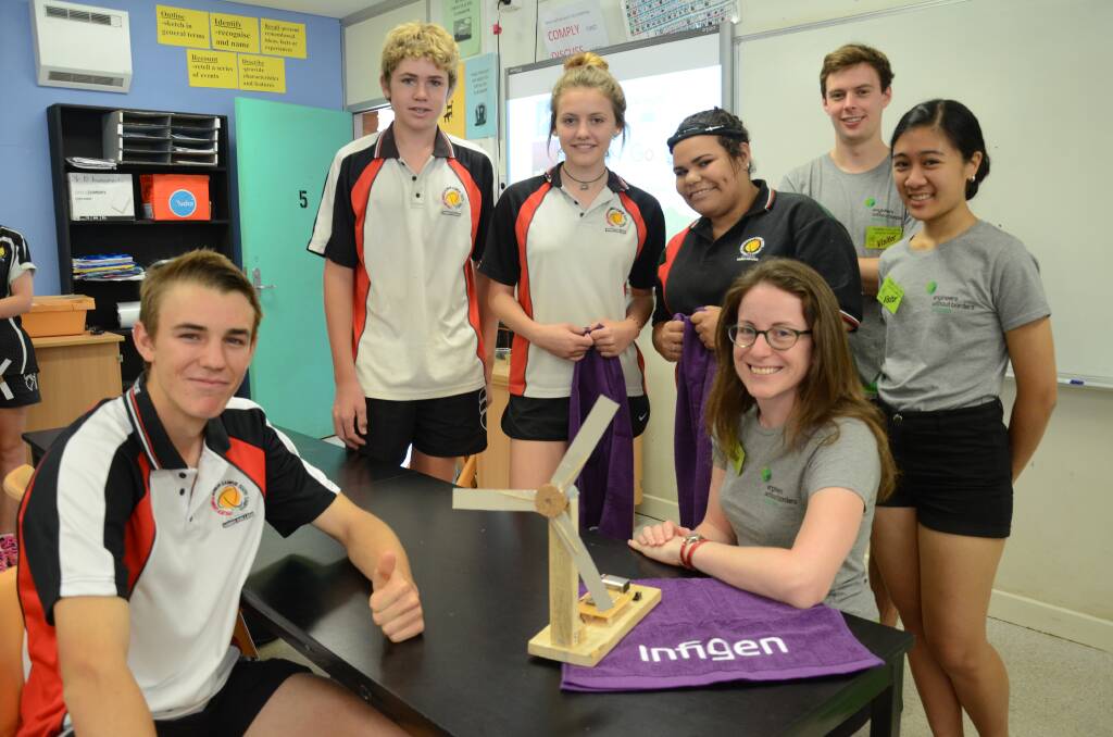 Bailey Aitken, Hanna Starr, Jaymealea Mofafi and Heath Irwin (front left) won a prize for their long-bladed turbine design, which impressed Engineers Without Borders Alex Warren, Rianna Bernal and Anna Cain (front right). 				  Photo: JENNIFER HOAR