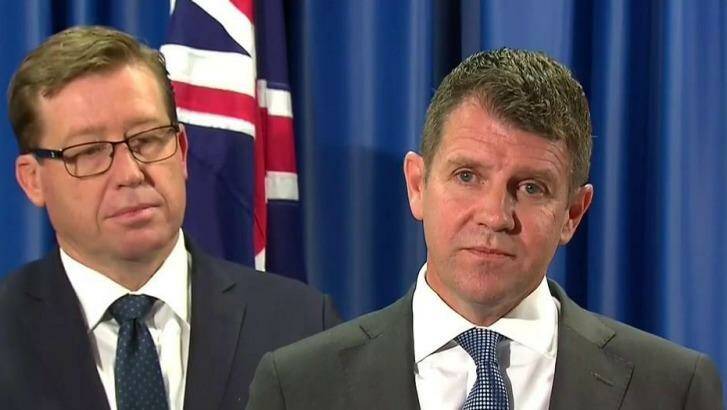 'I got it wrong': Premier Mike Baird with Deputy Premier Troy Grant on Tuesday.  Photo: Nine News