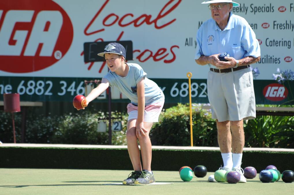 Justin Walsh gets ready to release his bowl during Sunday's game at Club Dubbo.