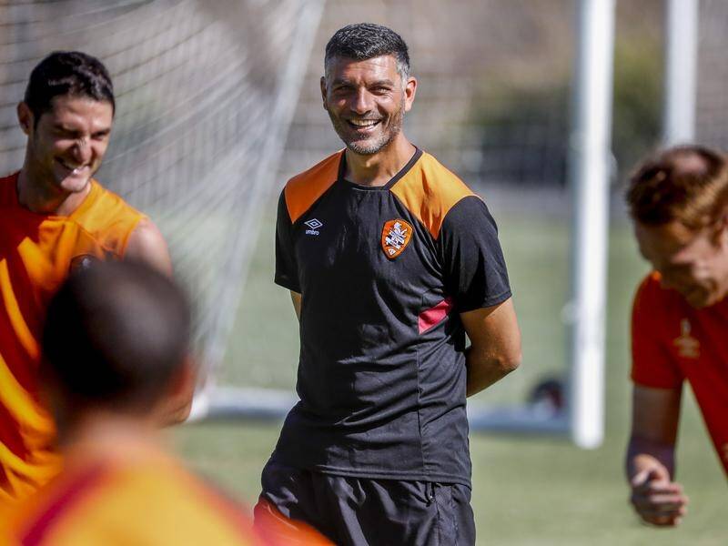 Brisbane coach John Aloisi denies reports he's interested in succeeding Graham Arnold at Sydney FC.