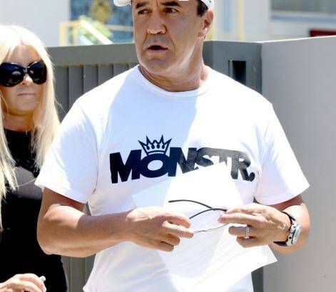 Jeff Fenech reads a statement outside his Five Dock home on Wednesday.
 Photo: Steven Siewert