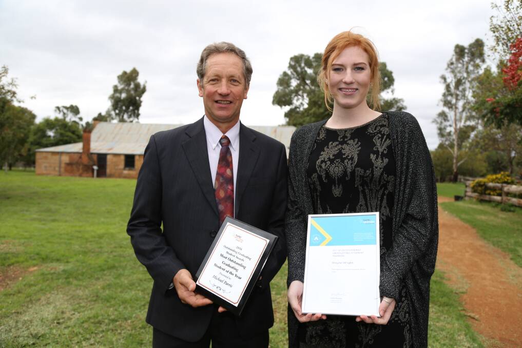 TAFE Western's Most Outstanding Graduating Student Michael Parris with runner-up, and 2015 TVET Student of the Year, Grace Parker. 												        Photo: SUPPLIED