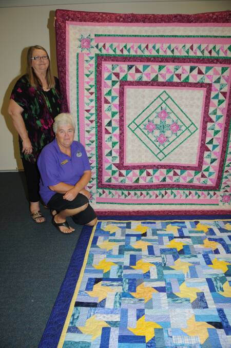 Dubbo Patchwork Group is gearing up for their exhibition in April, with vice president Leonie Kerr and life member Nola Jones with the incredible raffle prizes.